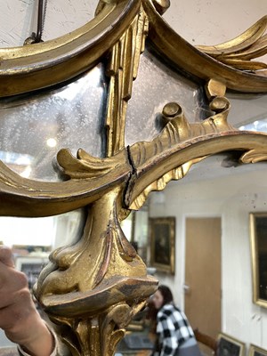 Lot 106 - A giltwood overmantel mirror