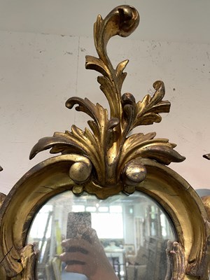 Lot 106 - A giltwood overmantel mirror