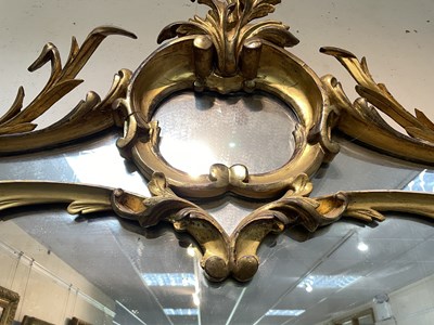 Lot 106 - A giltwood overmantel mirror