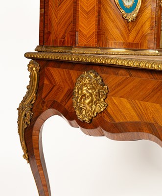Lot 53 - A Victorian ormolu mounted tulipwood and kingwood desk in the Louis XV style