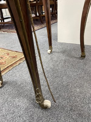 Lot 46 - A French gilt brass mounted kingwood and tulipwood centre table