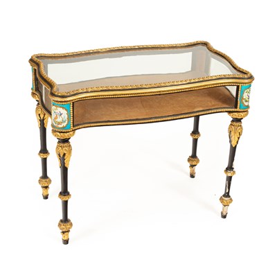 Lot 254 - A Napoleon III ebonised and gilt composition vitrine table