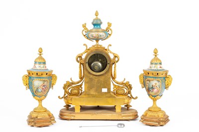 Lot 55 - A French ormolu mounted Sèvres style porcelain garniture de Cheminee