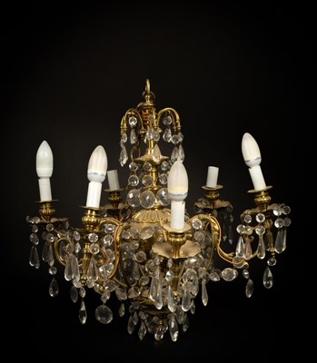 Lot 59 - A Dutch brass six-light chandelier