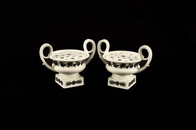 Lot 142 - A pair of Wedgwood white stoneware potpourri vases