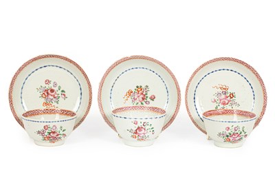Lot 81 - A set of three Chinese famille rose tea bowls and saucers