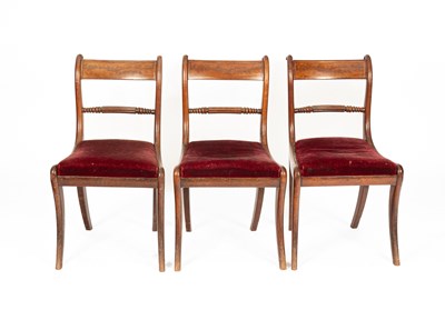 Lot 252 - Three Regency mahogany dining chairs