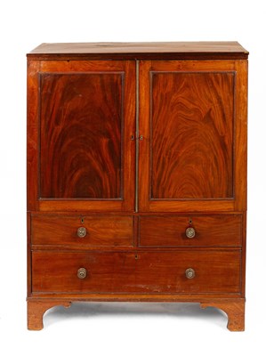 Lot 257 - A Regency mahogany linen press of small proportions