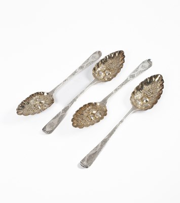 Lot 7 - Four George III silver berry spoons