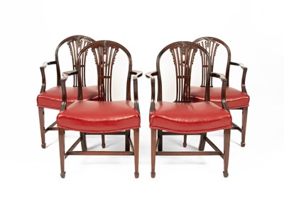 Lot 17 - A set of four George III mahogany open armchairs