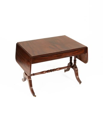Lot 18 - A Regency ebony inlaid mahogany sofa table