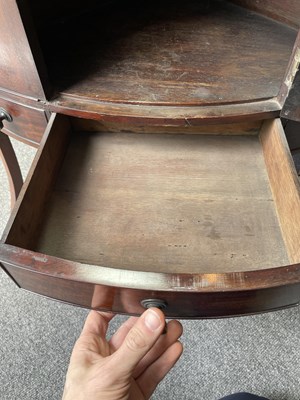 Lot 54 - A George III mahogany corner washstand