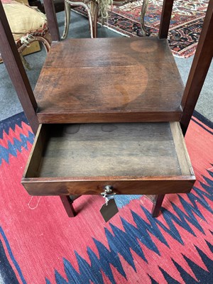 Lot 54 - A George III mahogany corner washstand