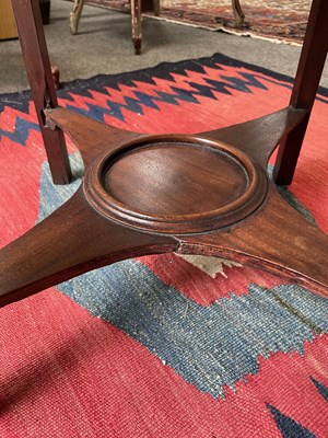 Lot 54 - A George III mahogany corner washstand