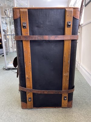 Lot 79 - A canvas and leather domed top trunk