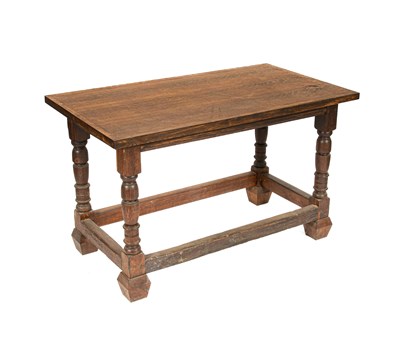 Lot 80 - An oak altar table