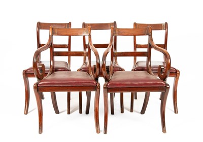 Lot 129 - A set of five Regency mahogany and brass inlaid dining chairs