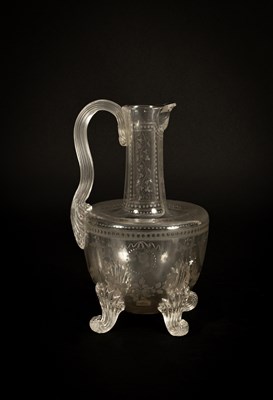 Lot 40 - An English engraved glass claret jug