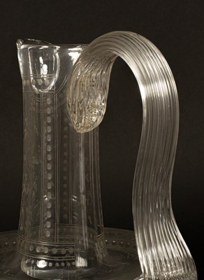 Lot 40 - An English engraved glass claret jug