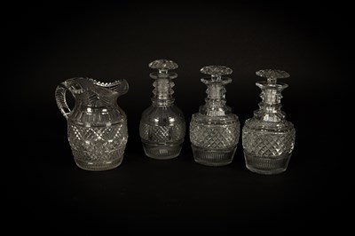 Lot 144 - A pair of Georgian cut glass decanters