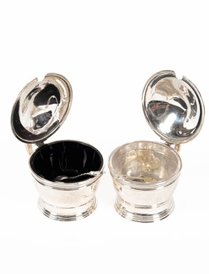 Lot 39 - A near pair of silver mustard pots