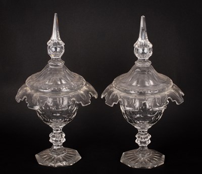 Lot 193 - A pair of cut glass bonbon dishes and covers