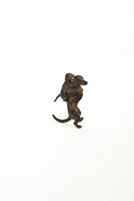 Lot 571 - A cold painted bronze figure of a fox with a duck in its mouth