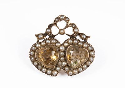 Lot 270 - A Victorian 9ct yellow gold citrine and seed pearl double-heart sweetheart brooch