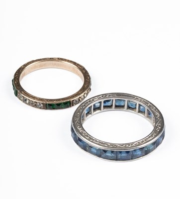 Lot 271 - A platinum and sapphire eternity ring