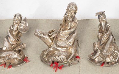 Lot 149 - A set of nine Chinese silver hat ornaments