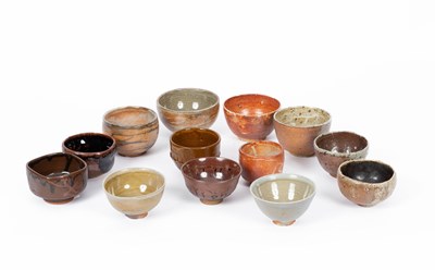 Lot 266 - Thirteen assorted studio pottery tea bowls and bowls