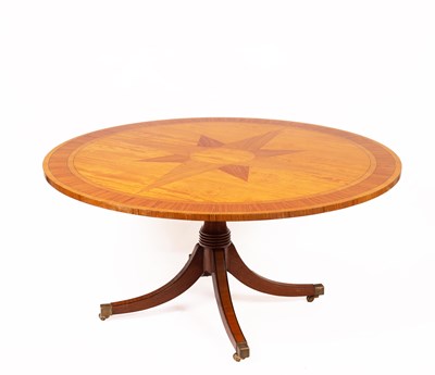Lot 603 - A satinwood and zebrano inlaid circular tilt top dining table