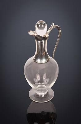 Lot 322 - A Dartington glass claret jug with silver mounts