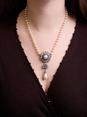 Lot 229 - A Victorian natural pearl and diamond pendant/brooch