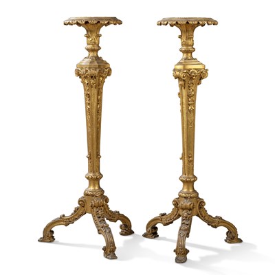 Lot 55 - A pair of George II giltwood torchères