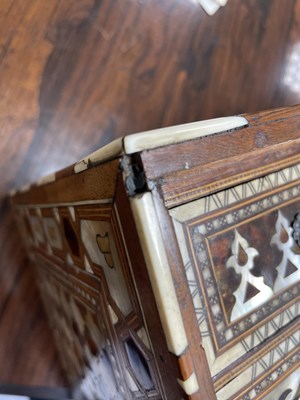 Lot 139 - An Ottoman Turkish tortoiseshell, bone and mother-of-pearl inlaid walnut table cabinet