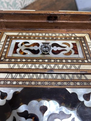 Lot 139 - An Ottoman Turkish tortoiseshell, bone and mother-of-pearl inlaid walnut table cabinet