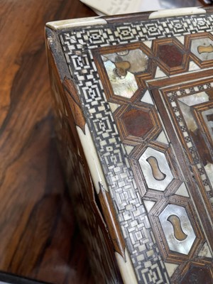 Lot 139 - An Ottoman Turkish tortoiseshell, bone and mother-of-pearl inlaid walnut table cabinet