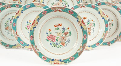 Lot 82 - A set of fourteen Chinese famille rose plates
