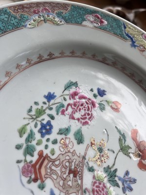 Lot 82 - A set of fourteen Chinese famille rose plates