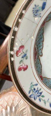 Lot 22 - A set of four Chinese famille rose plates