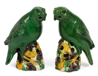 Lot 86 - A pair of Chinese stoneware parrots