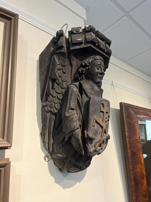 Lot 192 - A matching set of large carved oak angel corbels