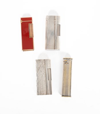 Lot 880 - Four Dunhill Lighters