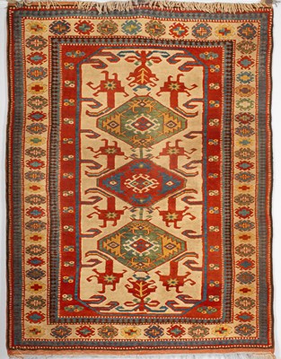 Lot 734 - A Kazak Design rug