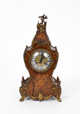 Lot 748 - A French marquetry cased mantel clock