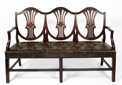 Lot 591 - A George III style mahogany triple chair back settee