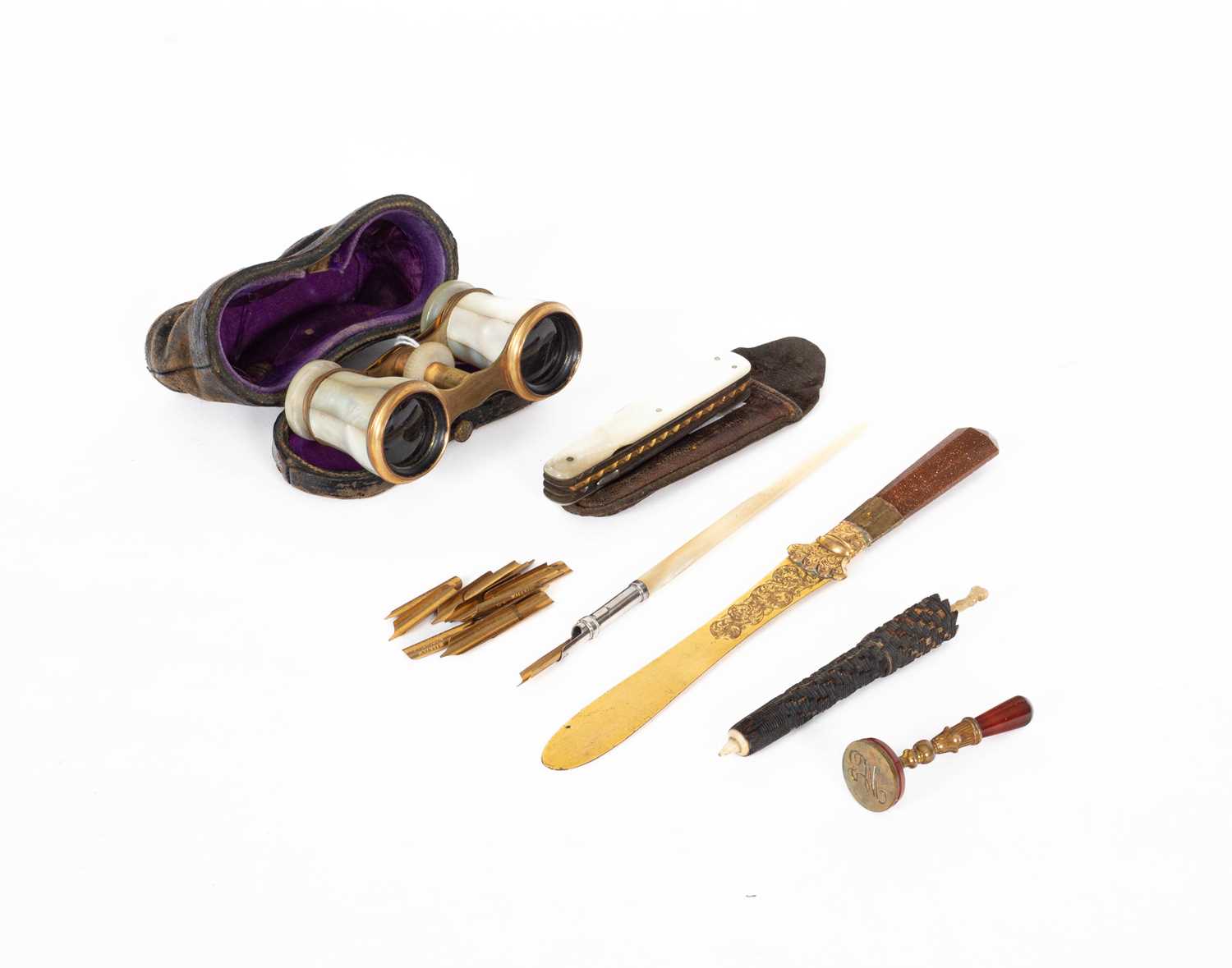 Lot 842 - A gilt metal and goldstone letter opener