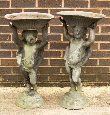 Lot 550 - A pair of lead cherub figures