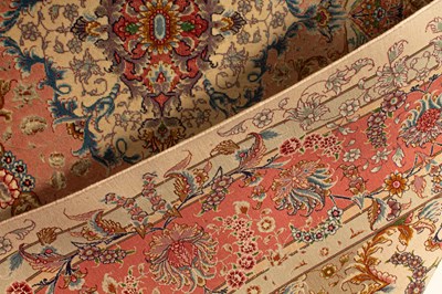 Lot 733 - A fine part silk Tabriz rug
